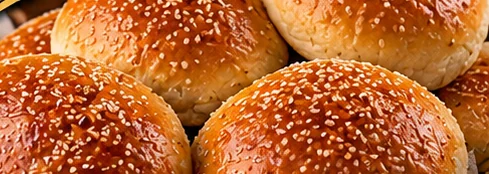 Sesame hamburger buns in a basket