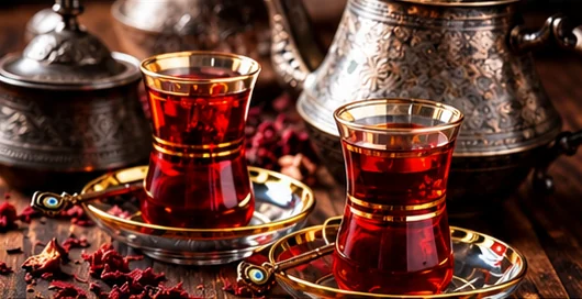 Two glasses of Turkish tea on a silver tray